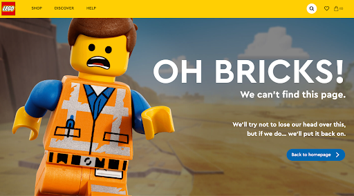 Lego 404 page. Primary navigation is at the top.  Text reads Oh Bricks We can't this page. We'll try not to lose our head over this, but if we do, we'll put it back on.  Below is a blue button with white text that reads Back to Home page.